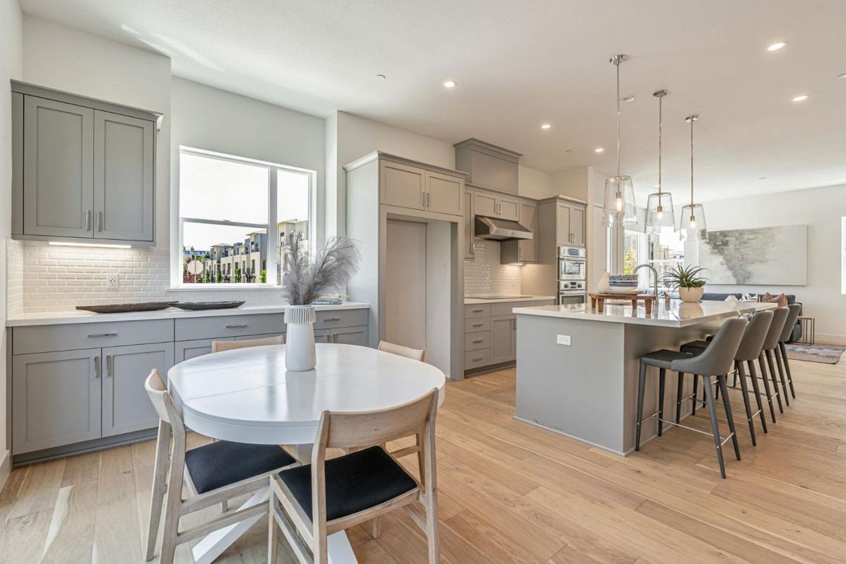 Dining room, Interior, Kitchen, Pendant Lights, Recessed Lighting, Stainless Steel Appliances, Wood Texture Flooring