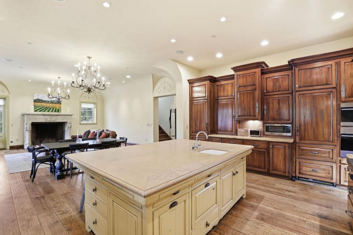 Chandelier, Dining room, Fireplace, Interior, Kitchen, Living room, Recessed Lighting, Wood Texture Flooring