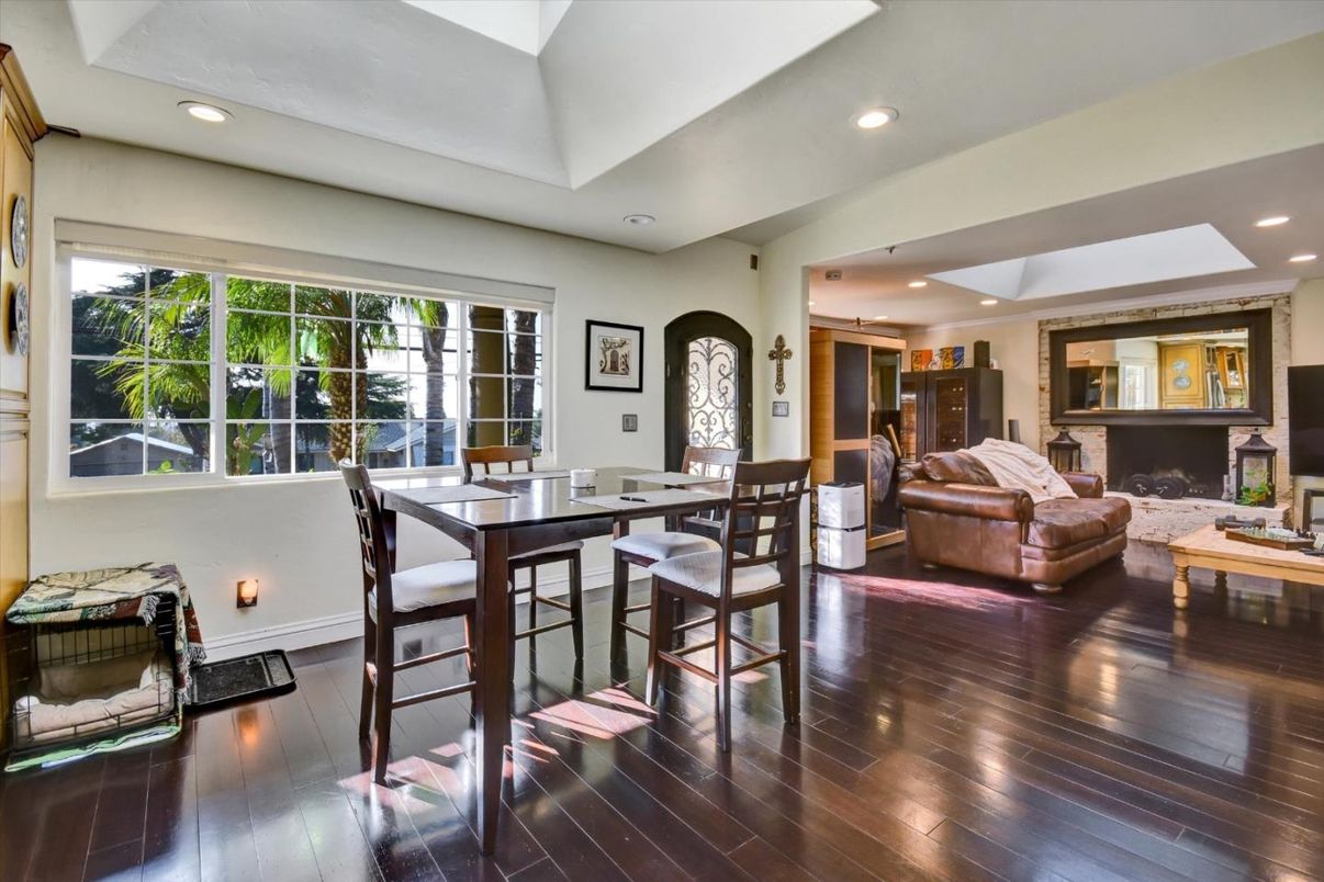 Dining room, Fireplace, Interior, Living room, Recessed Lighting, Wood Texture Flooring