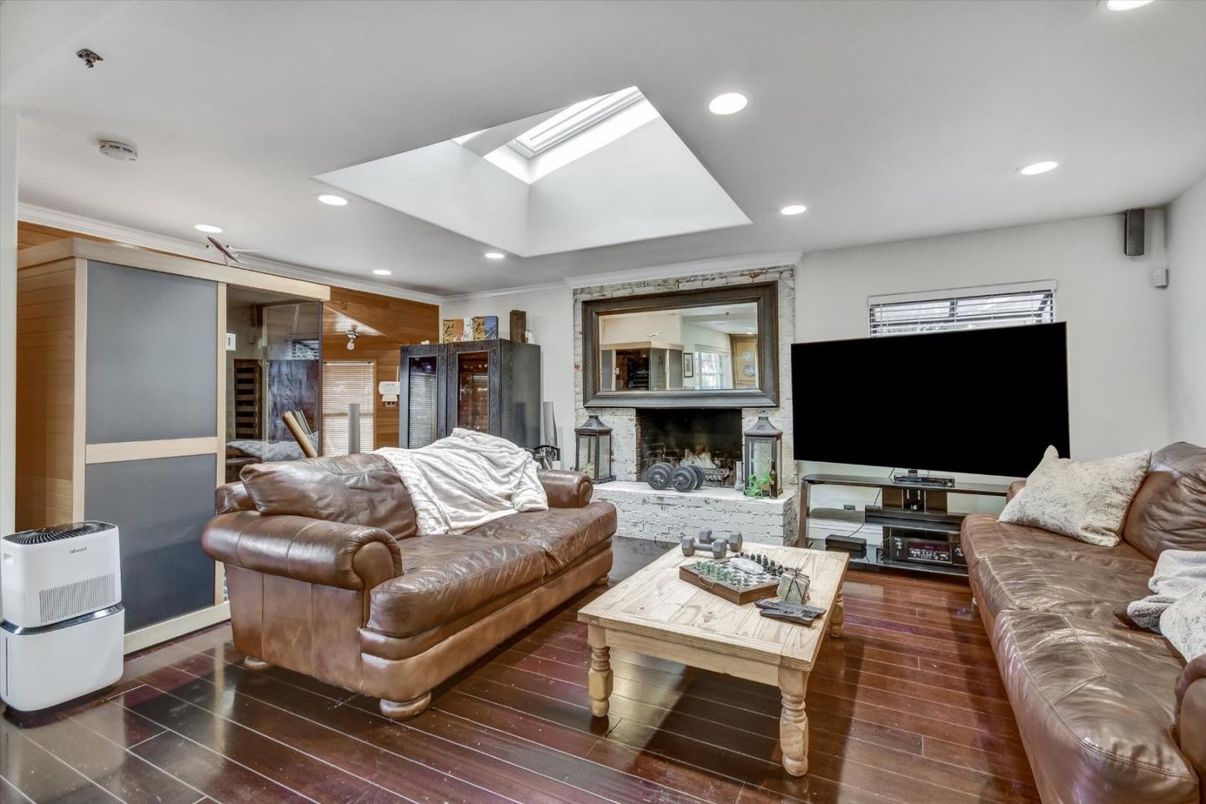 Fireplace, Interior, Living room, Recessed Lighting, Wood Texture Flooring, Wooden Walls