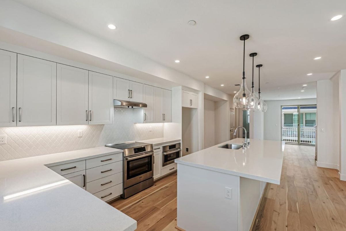Interior, Kitchen, Pendant Lights, Recessed Lighting, Stainless Steel Appliances, Wood Texture Flooring