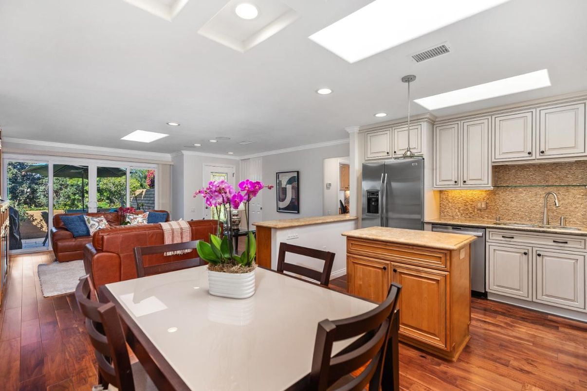 Dining room, Interior, Kitchen, Living room, Pendant Lights, Recessed Lighting, Stainless Steel Appliances, Wood Texture Flooring