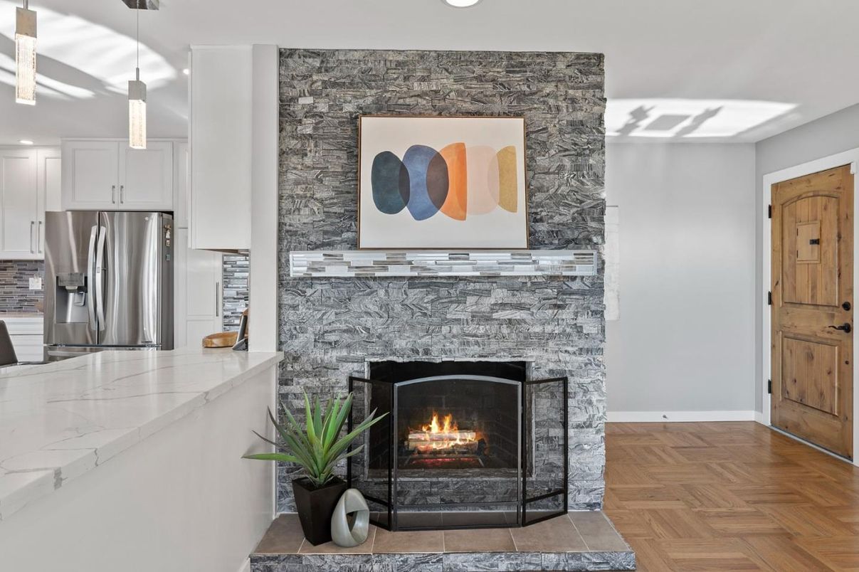 Fireplace, Interior, Kitchen, Pendant Lights, Recessed Lighting, Stainless Steel Appliances, Wood Texture Flooring