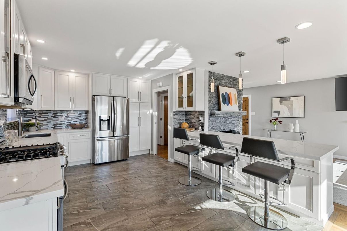 Interior, Kitchen, Pendant Lights, Recessed Lighting, Stainless Steel Appliances, Stone Walls, Wood Texture Flooring