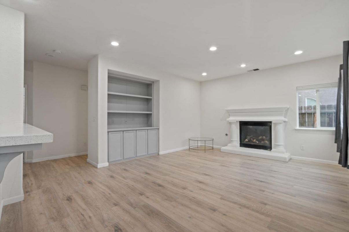 Empty room, Fireplace, Interior, Recessed Lighting, Wood Texture Flooring