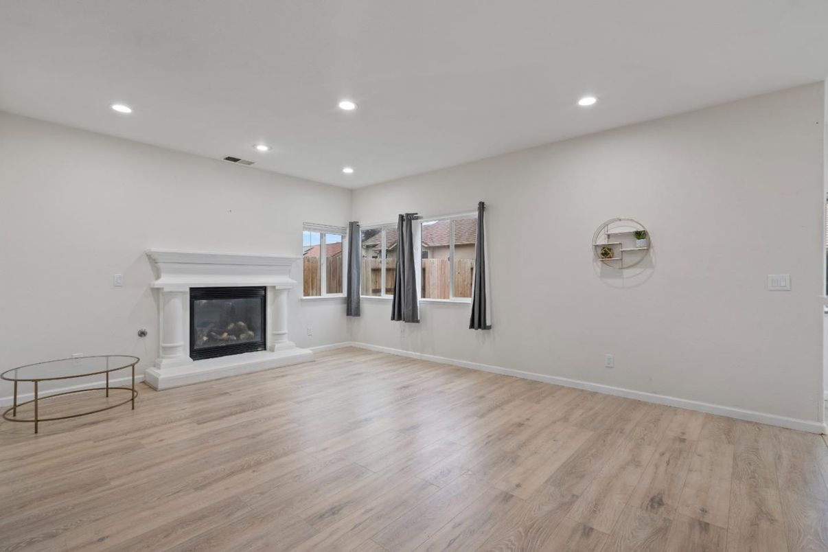 Empty room, Fireplace, Interior, Recessed Lighting, Wood Texture Flooring