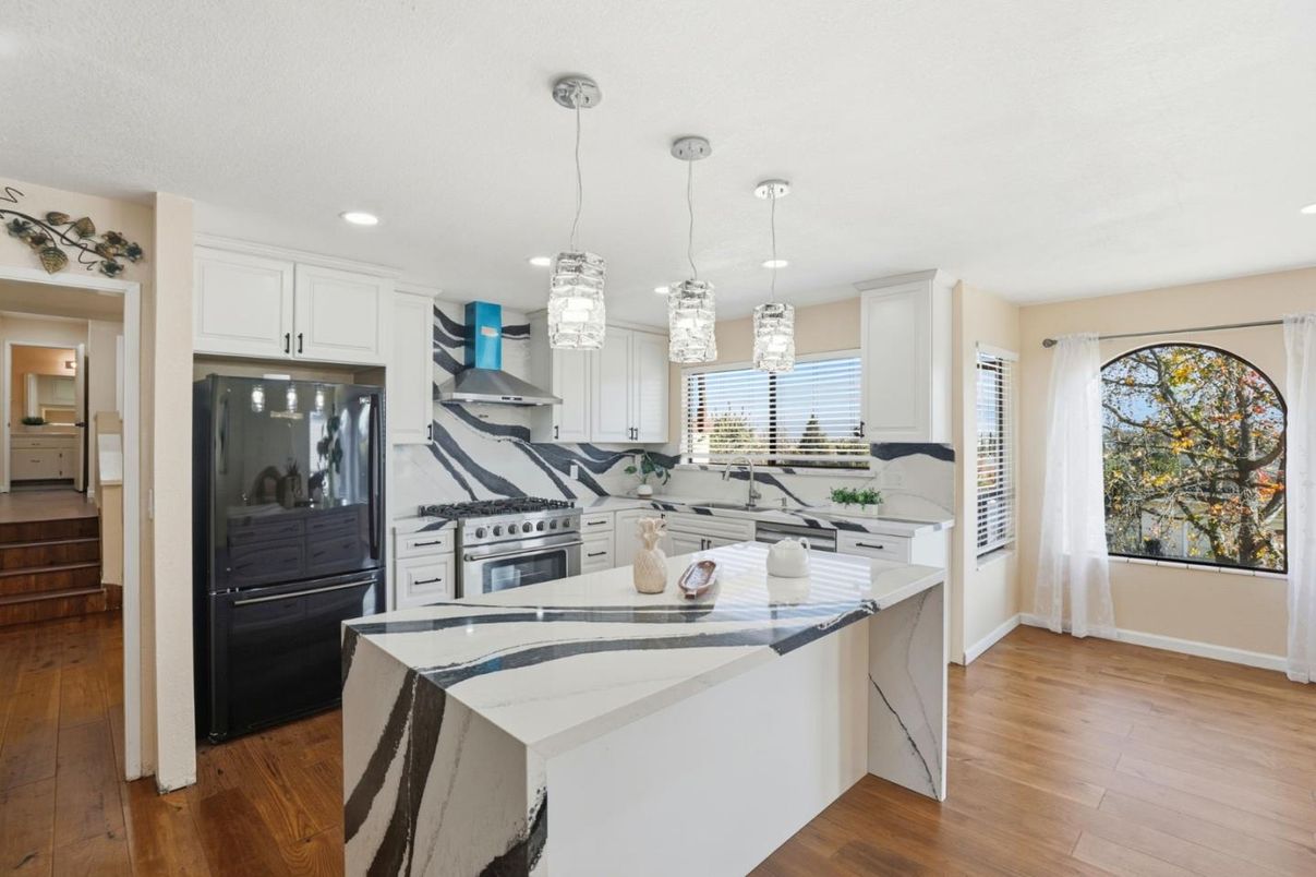 Interior, Kitchen, Pendant Lights, Recessed Lighting, Stainless Steel Appliances, Wood Texture Flooring