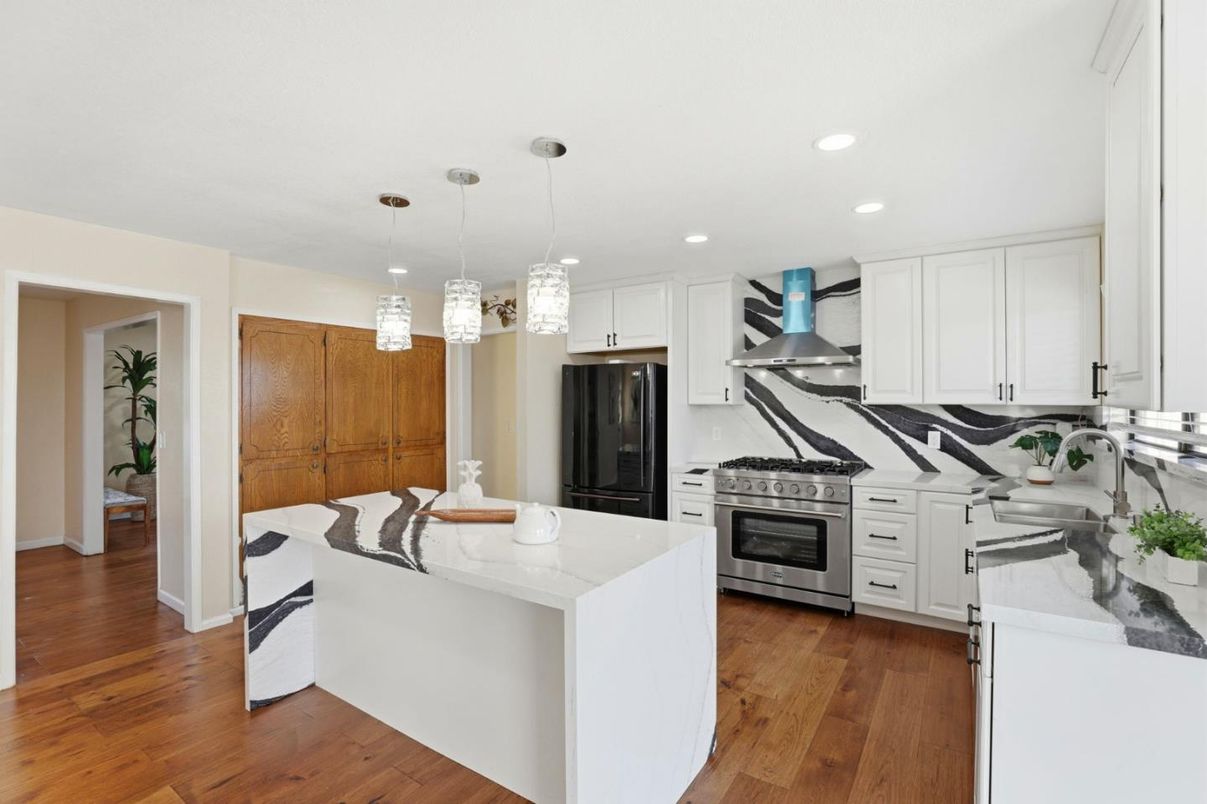 Interior, Kitchen, Pendant Lights, Recessed Lighting, Stainless Steel Appliances, Wood Texture Flooring