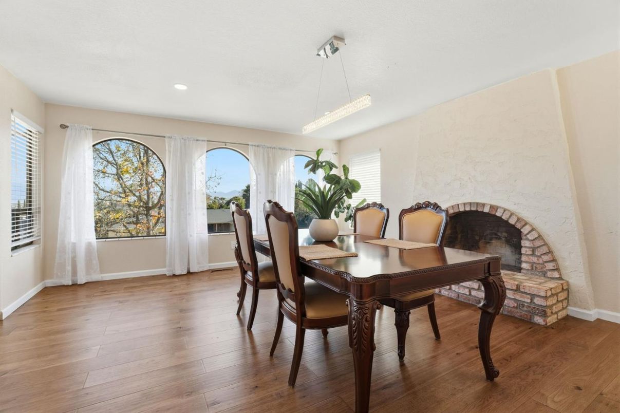Dining room, Fireplace, Interior, Pendant Lights, Recessed Lighting, Wood Texture Flooring