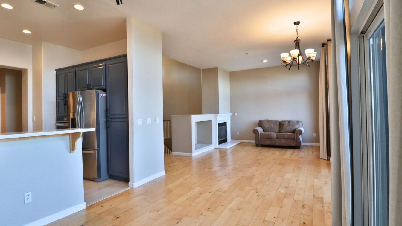 Chandelier, Fireplace, Interior, Kitchen, Recessed Lighting, Wood Texture Flooring
