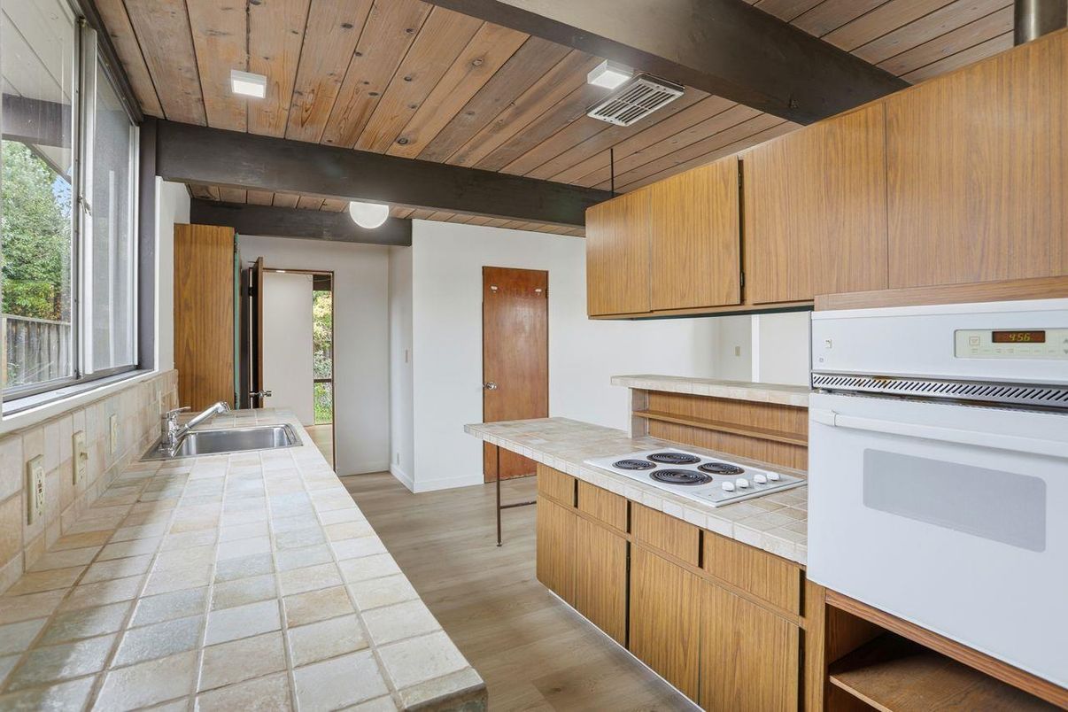 Interior, Kitchen, Tile Countertops, Wooden Ceilings, Wood Texture Flooring