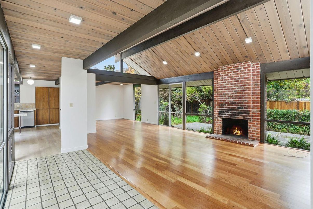 Empty room, Fireplace, Interior, Kitchen, Recessed Lighting, Stone Walls, Wooden Ceilings, Wood Texture Flooring