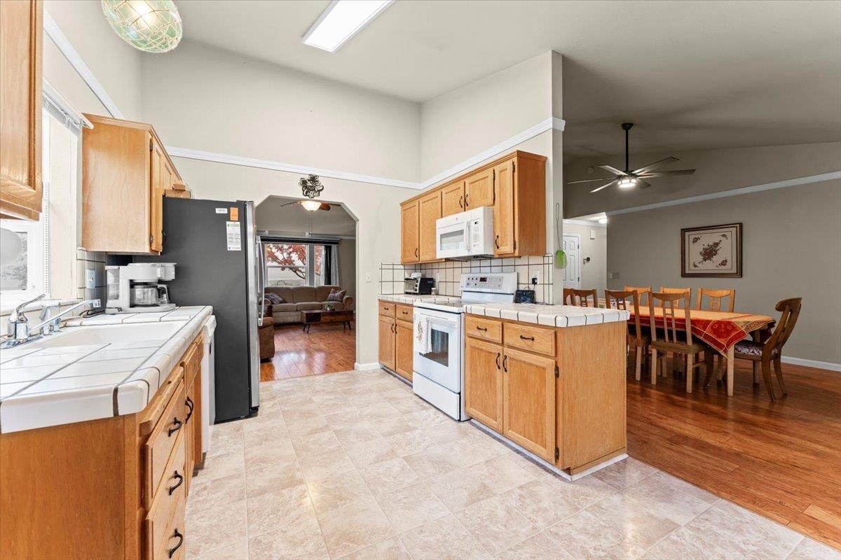 Dining room, Interior, Kitchen, Tile Countertops, Wood Texture Flooring