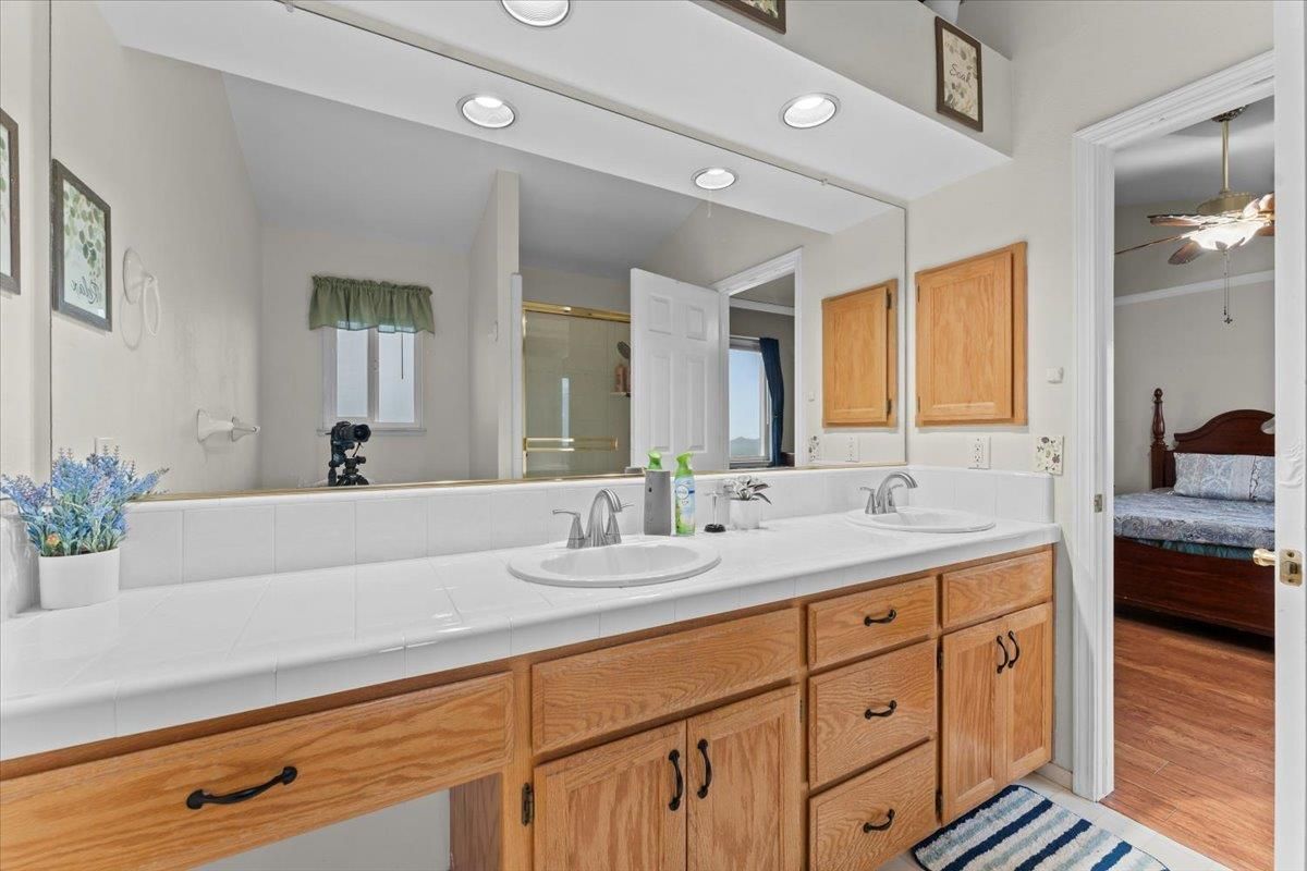 Bathroom, Bedroom, Dual Sink Vanities, Interior, Recessed Lighting, Tile Countertops, Wood Texture Flooring