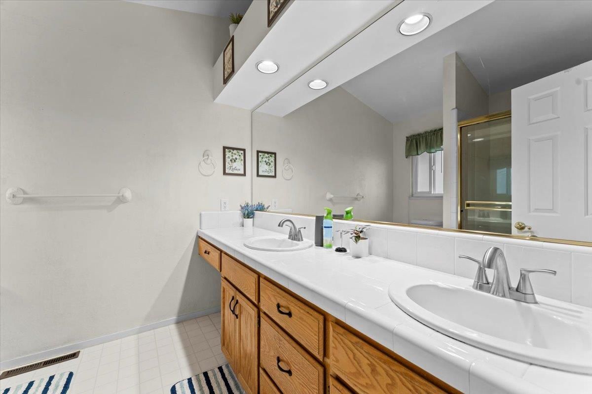 Bathroom, Dual Sink Vanities, Interior, Recessed Lighting, Tile Countertops