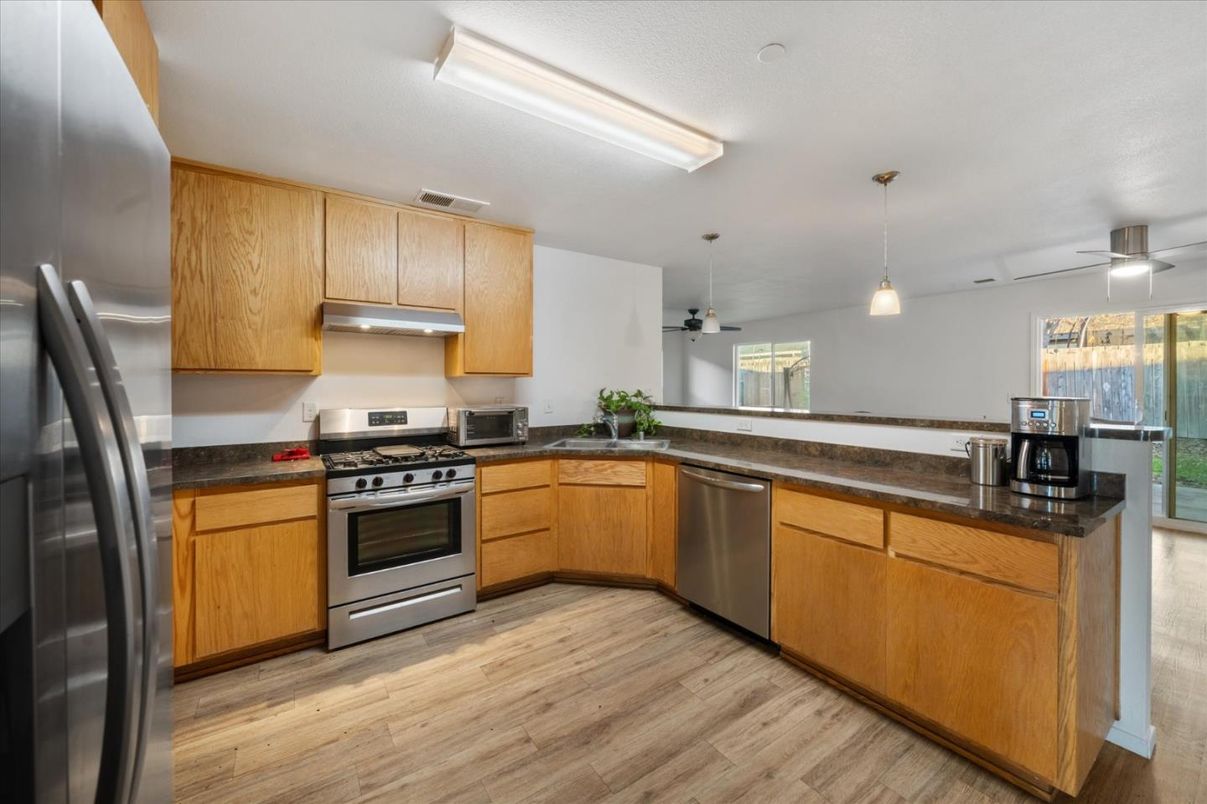 Interior, Kitchen, Pendant Lights, Stainless Steel Appliances, Wood Texture Flooring