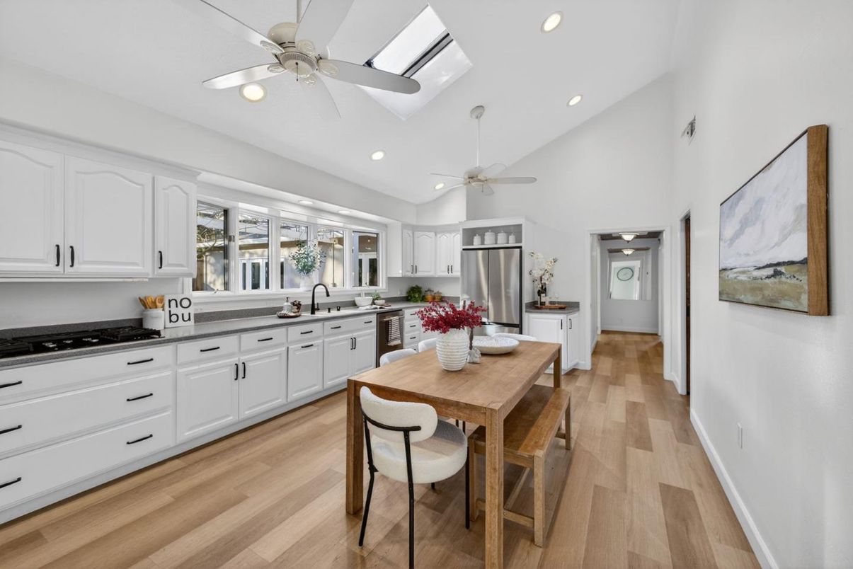 Dining room, Interior, Kitchen, Recessed Lighting, Stainless Steel Appliances, Wood Texture Flooring