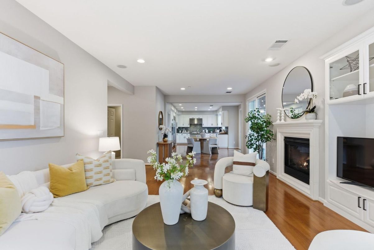 Dining room, Fireplace, Interior, Kitchen, Living room, Recessed Lighting, Stainless Steel Appliances, Wood Texture Flooring