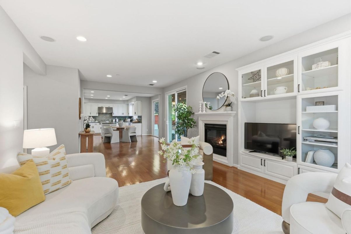 Dining room, Fireplace, Interior, Kitchen, Living room, Recessed Lighting, Stainless Steel Appliances, Wood Texture Flooring