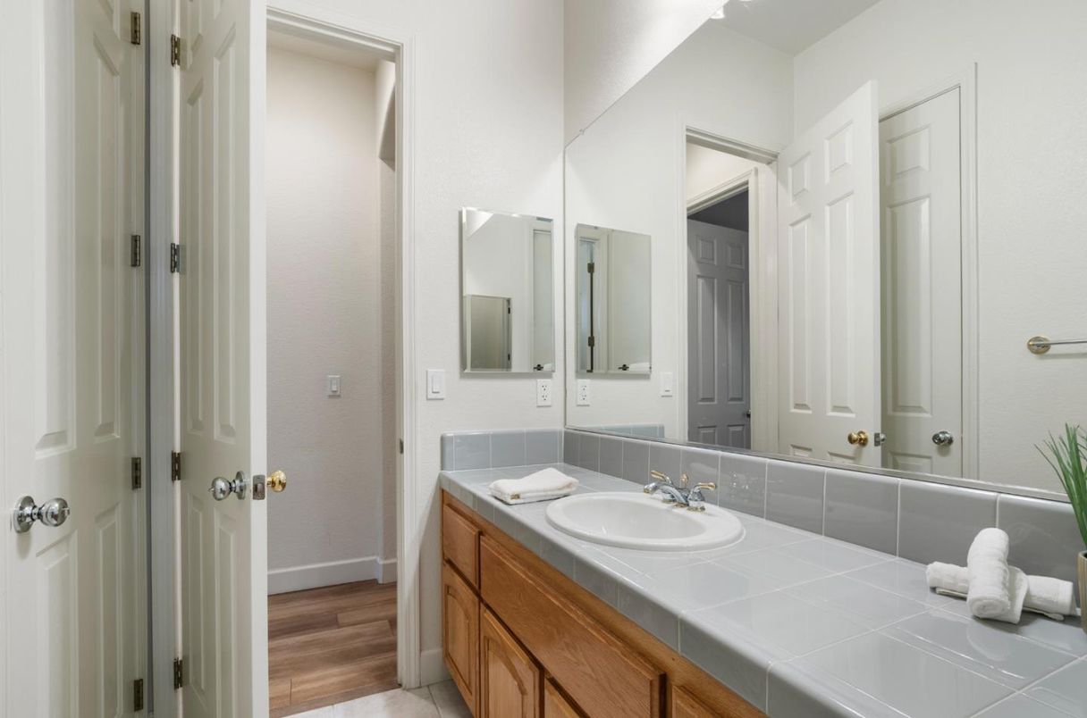 Bathroom, Dual Sink Vanities, Interior, Tile Countertops, Wood Texture Flooring