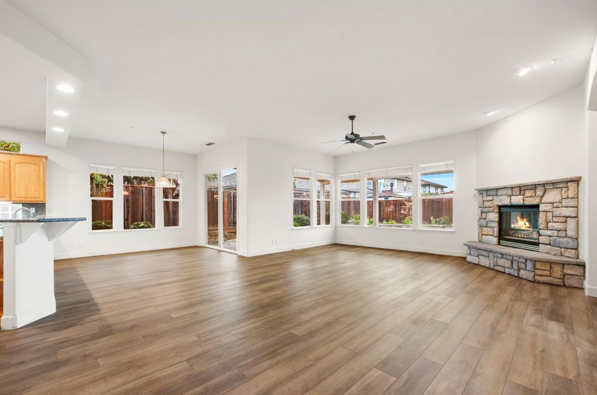 Empty room, Fireplace, Interior, Pendant Lights, Recessed Lighting, Wood Texture Flooring