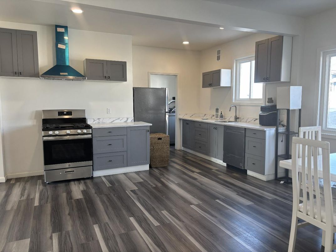 Interior, Kitchen, Recessed Lighting, Stainless Steel Appliances, Wood Texture Flooring