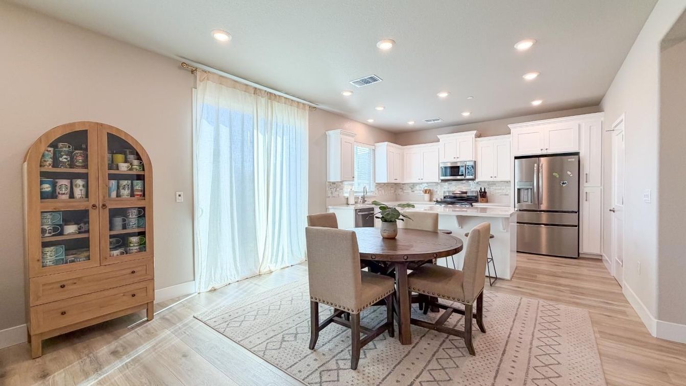 Dining room, Interior, Kitchen, Recessed Lighting, Stainless Steel Appliances, Wood Texture Flooring