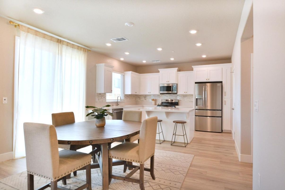 Dining room, Interior, Kitchen, Recessed Lighting, Stainless Steel Appliances, Wood Texture Flooring