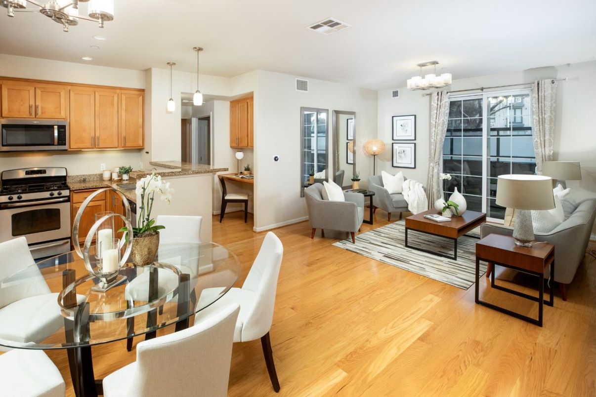 Chandelier, Dining room, Interior, Kitchen, Living room, Pendant Lights, Recessed Lighting, Stainless Steel Appliances, Wood Texture Flooring