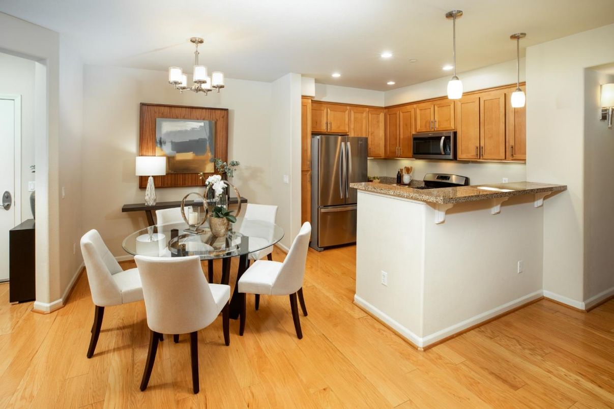 Chandelier, Dining room, Interior, Kitchen, Pendant Lights, Recessed Lighting, Stainless Steel Appliances, Wood Texture Flooring