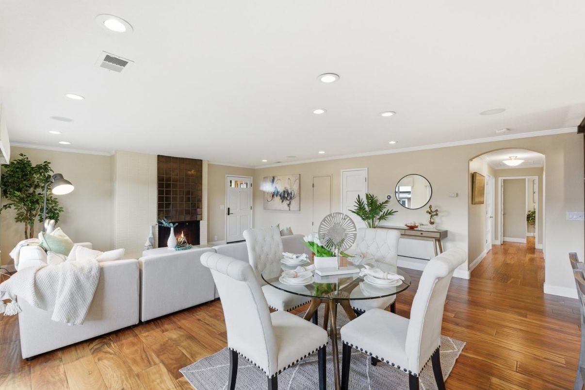 Dining room, Fireplace, Interior, Living room, Recessed Lighting, Wood Texture Flooring