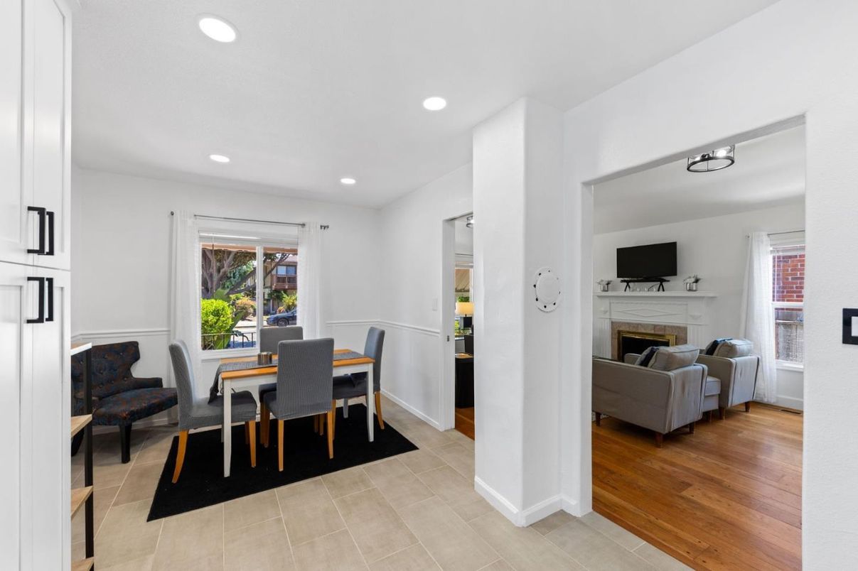 Dining room, Fireplace, Interior, Living room, Recessed Lighting, Wood Texture Flooring
