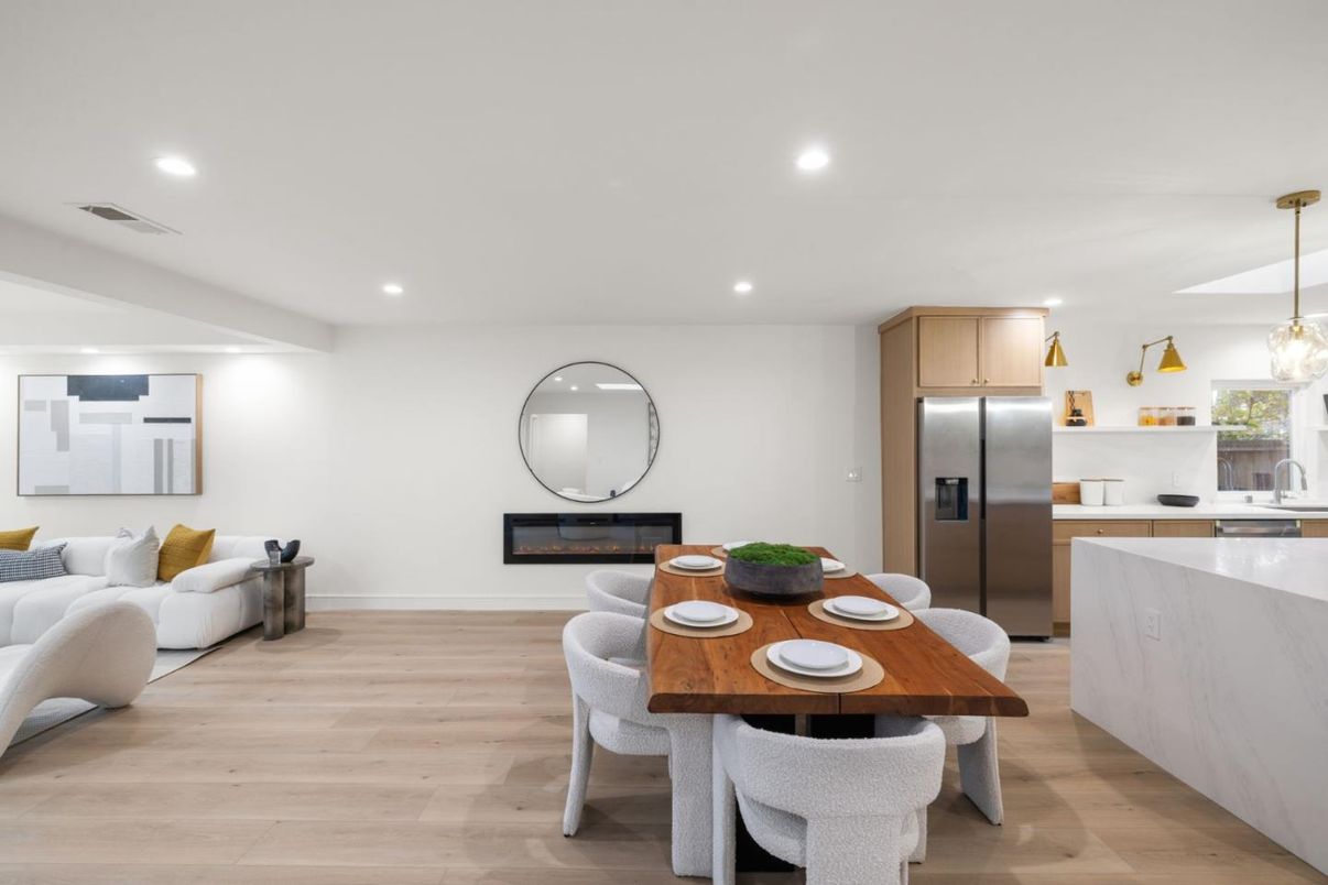 Dining room, Fireplace, Interior, Kitchen, Living room, Pendant Lights, Recessed Lighting, Stainless Steel Appliances, Wood Texture Flooring