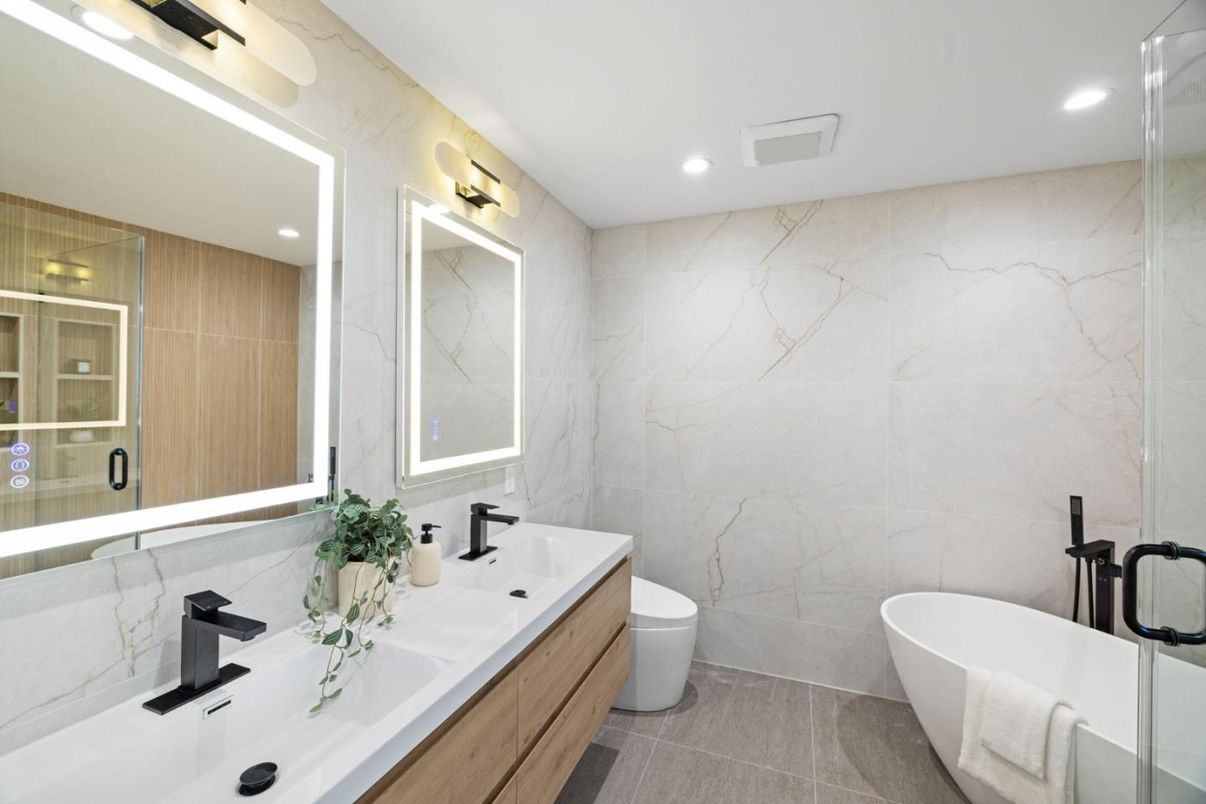 Bathroom, Dual Sink Vanities, Free Standing Baths, Glass Shower, Interior, Marble Walls, Recessed Lighting