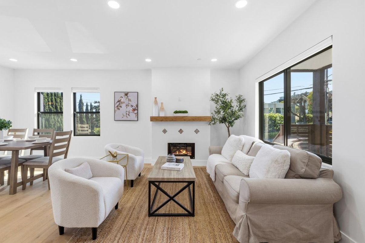 Dining room, Fireplace, Interior, Living room, Recessed Lighting, Wood Texture Flooring