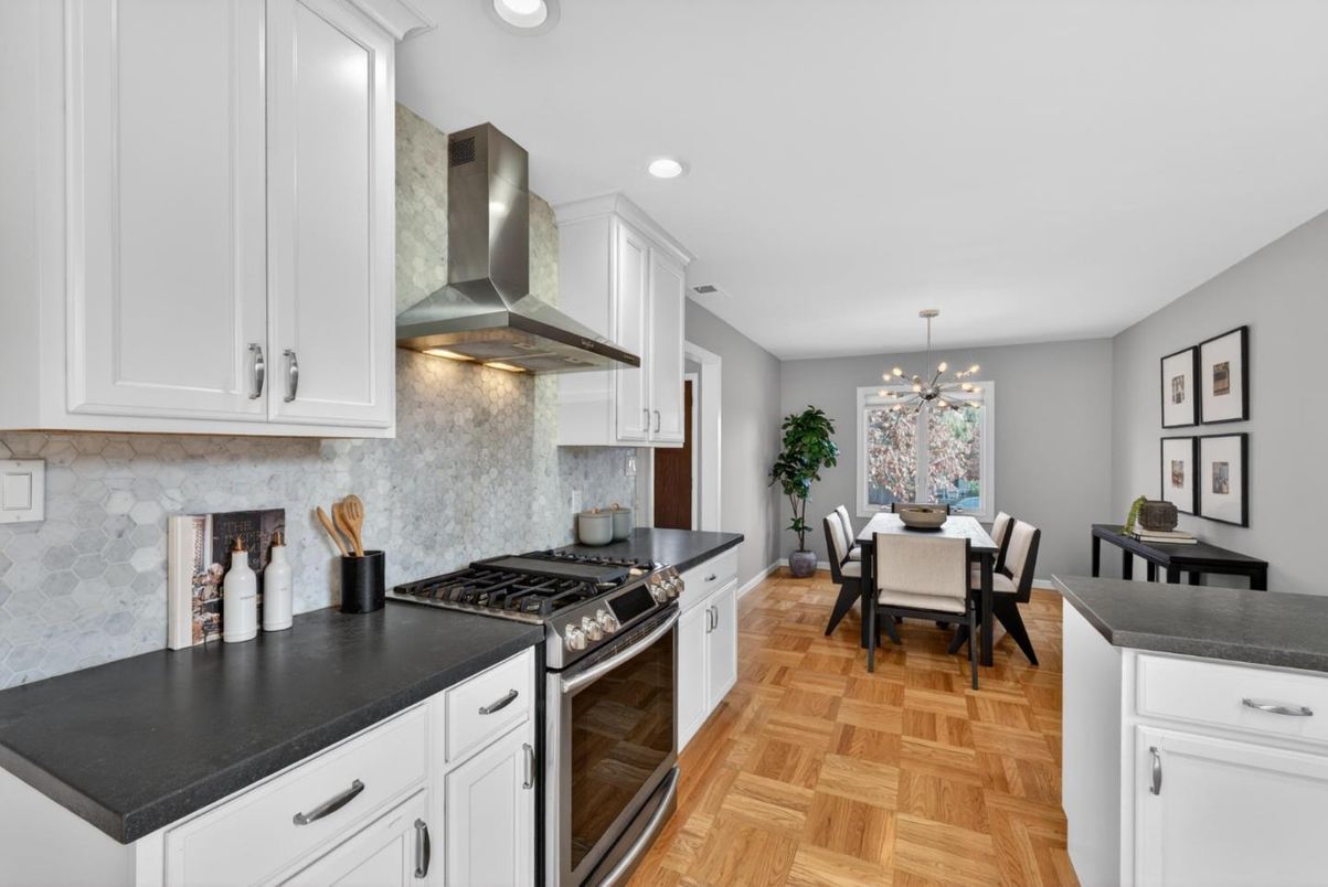 Dining room, Interior, Kitchen, Pendant Lights, Recessed Lighting, Stainless Steel Appliances, Wood Texture Flooring