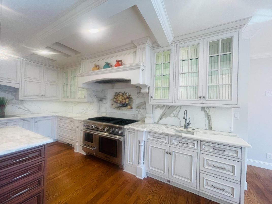 Interior, Kitchen, Marble Walls, Recessed Lighting, Stainless Steel Appliances, Wood Texture Flooring