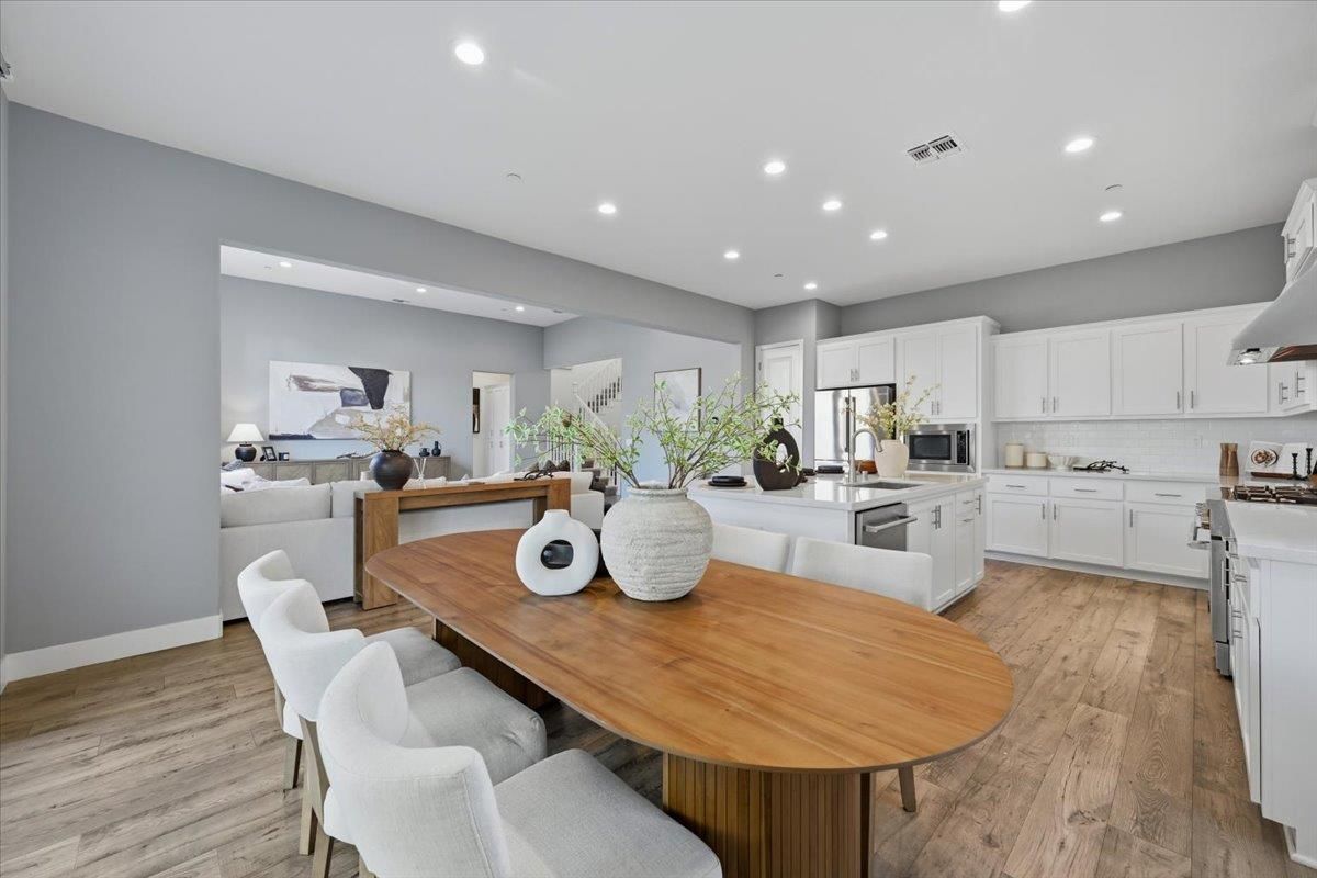 Dining room, Interior, Kitchen, Living room, Recessed Lighting, Stainless Steel Appliances, Wood Texture Flooring