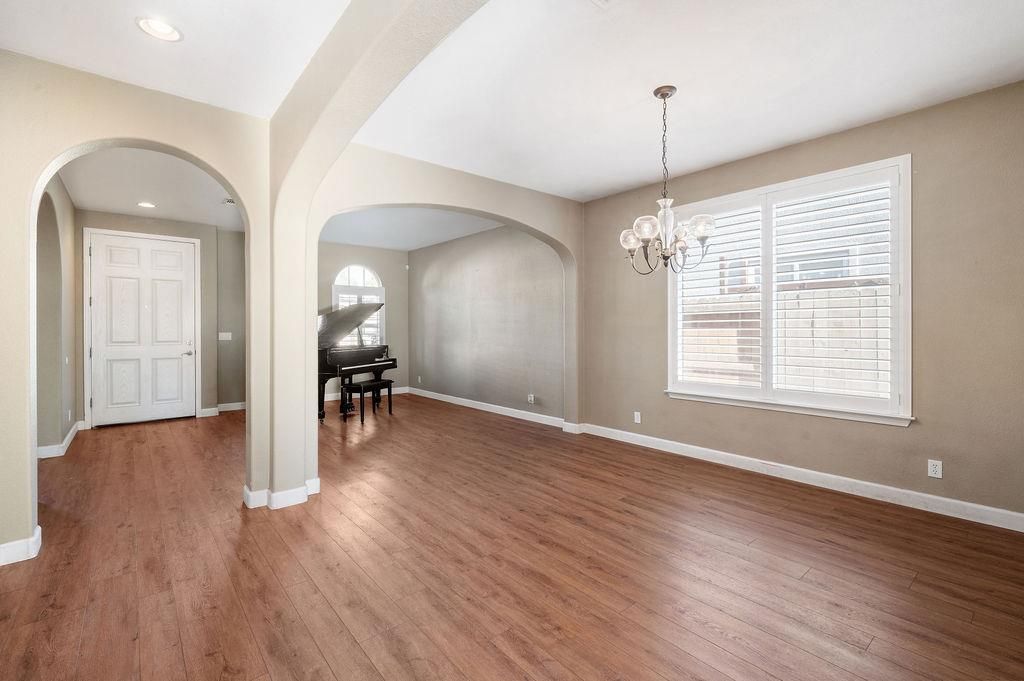 Chandelier, Interior, Piano, Recessed Lighting, Wood Texture Flooring