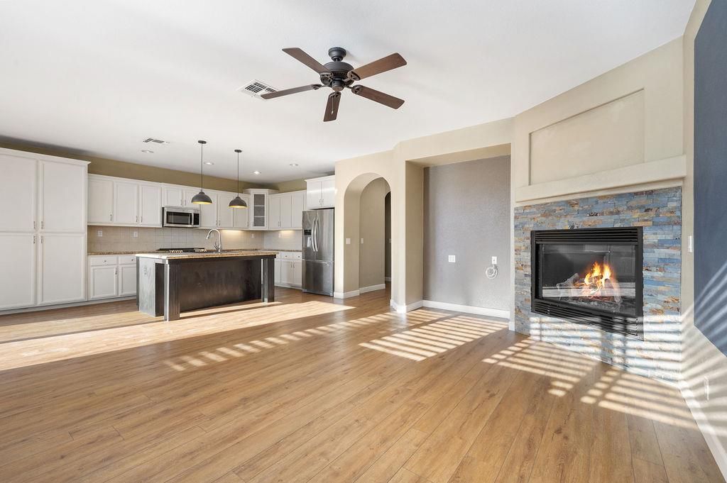 Fireplace, Interior, Kitchen, Pendant Lights, Recessed Lighting, Stainless Steel Appliances, Wood Texture Flooring