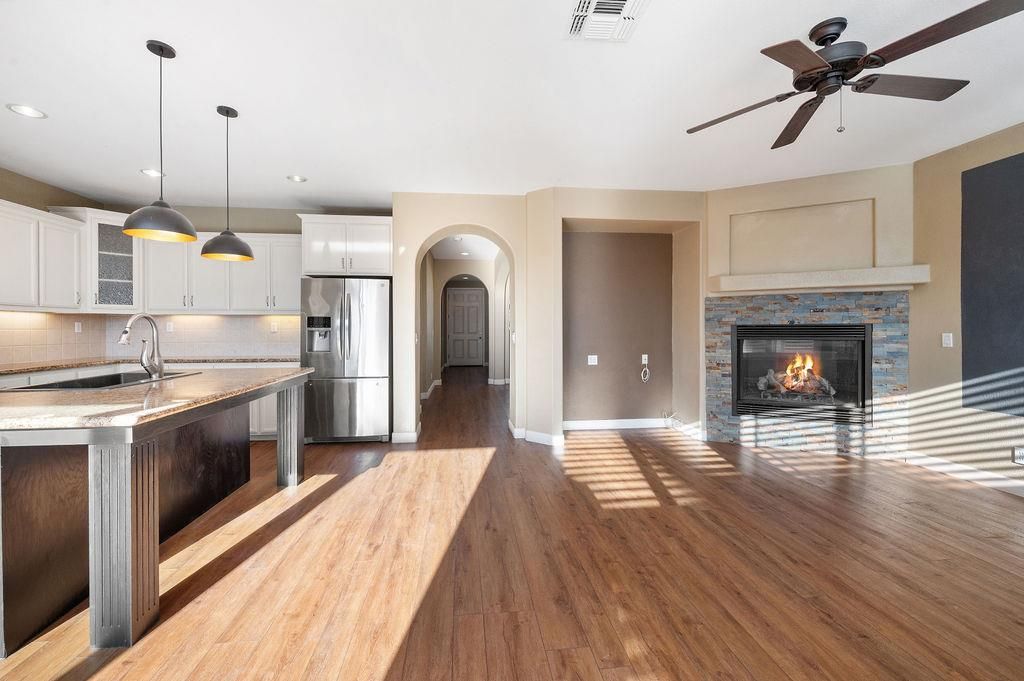 Fireplace, Interior, Kitchen, Pendant Lights, Recessed Lighting, Stainless Steel Appliances, Wood Texture Flooring
