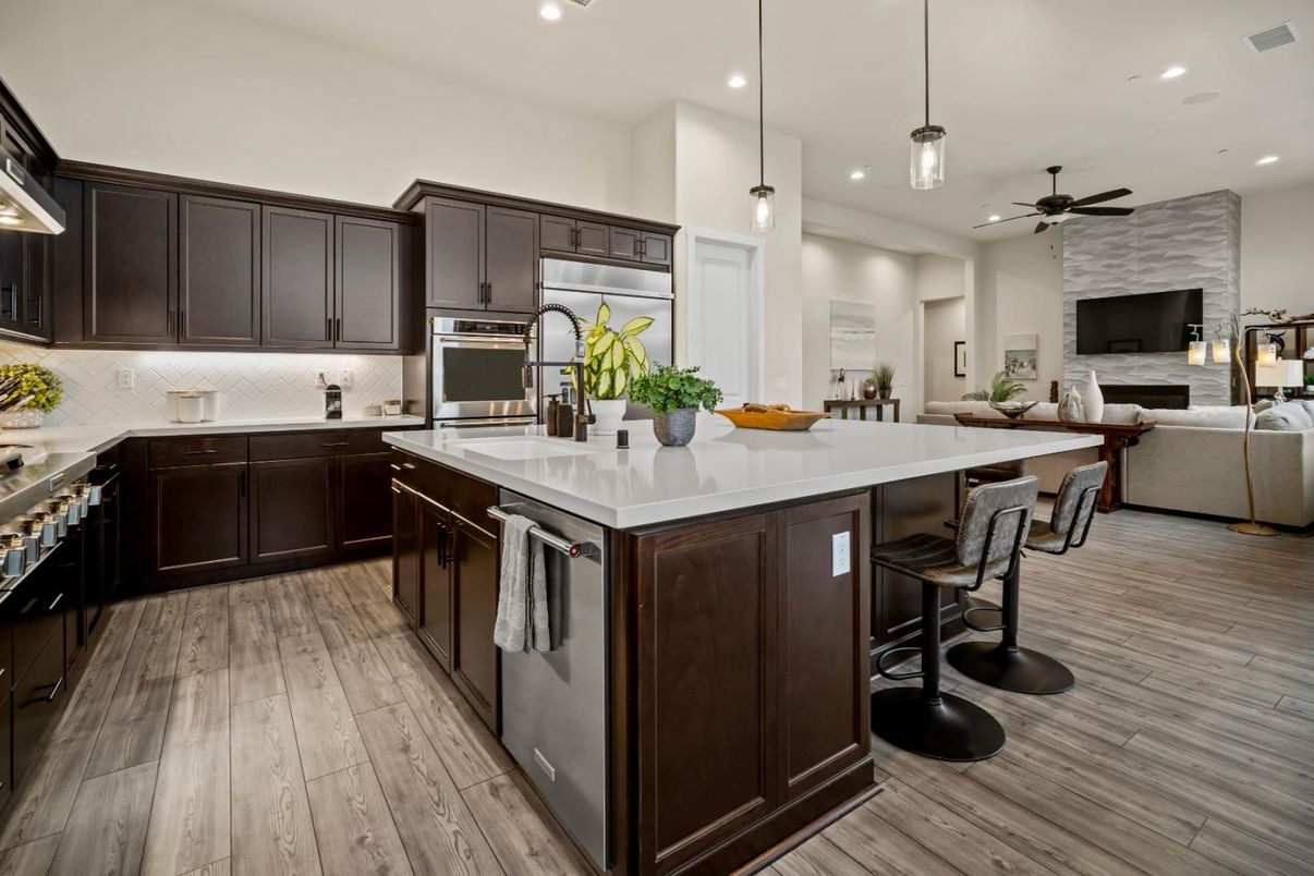 Fireplace, Interior, Kitchen, Living room, Pendant Lights, Recessed Lighting, Stainless Steel Appliances, Wood Texture Flooring