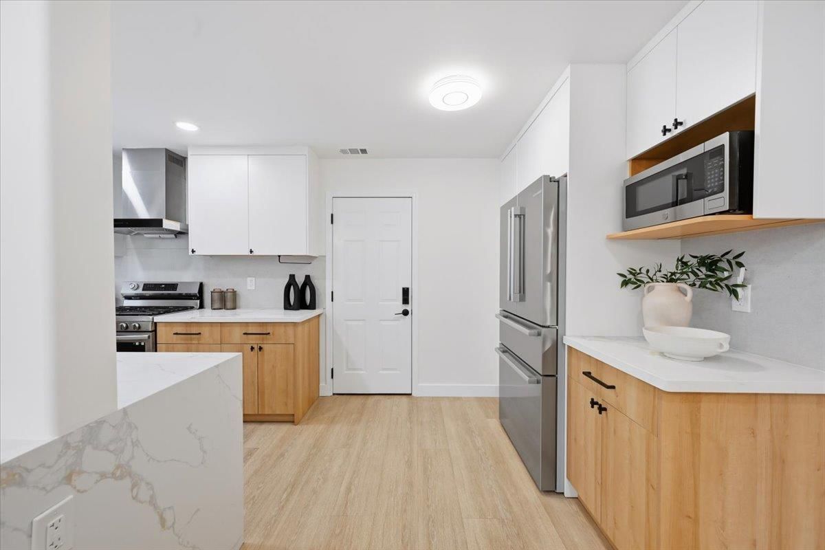 Interior, Kitchen, Recessed Lighting, Stainless Steel Appliances, Wood Texture Flooring