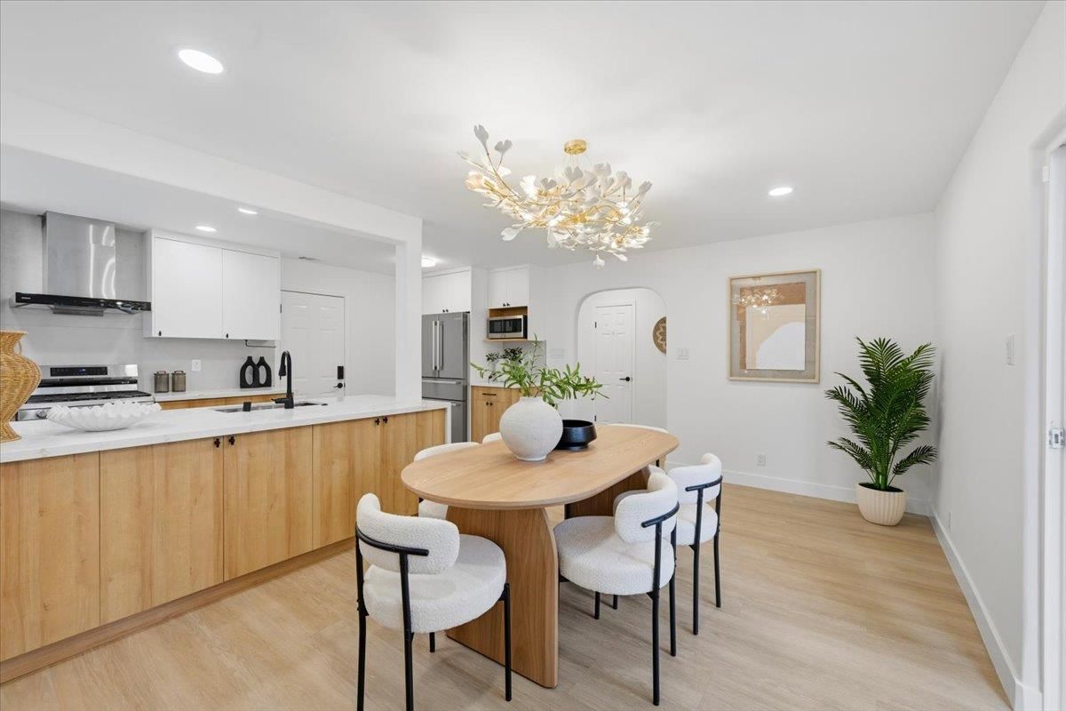 Dining room, Interior, Kitchen, Recessed Lighting, Stainless Steel Appliances, Wood Texture Flooring