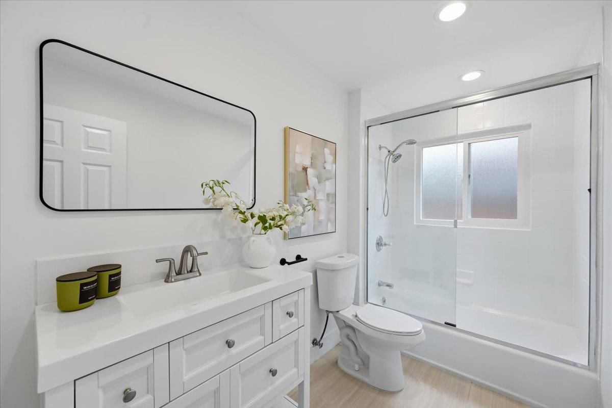 Bathroom, Dual Sink Vanities, Glass Shower, Interior, Recessed Lighting, Wood Texture Flooring