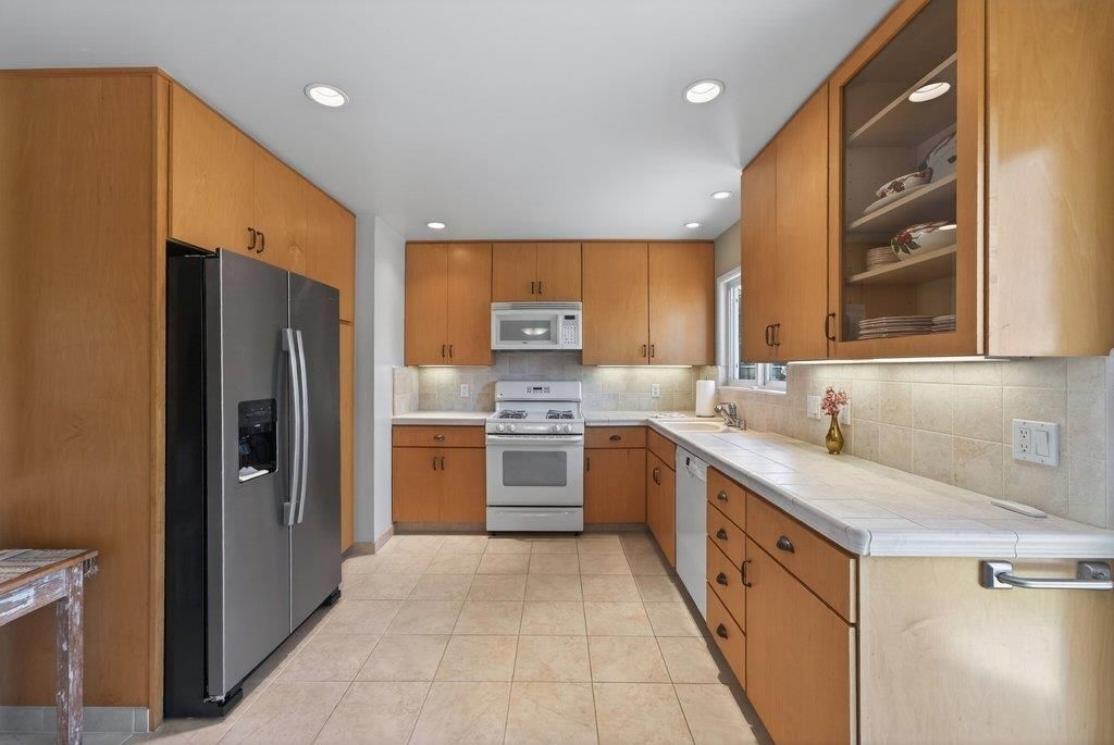 Interior, Kitchen, Recessed Lighting, Stainless Steel Appliances, Tile Countertops