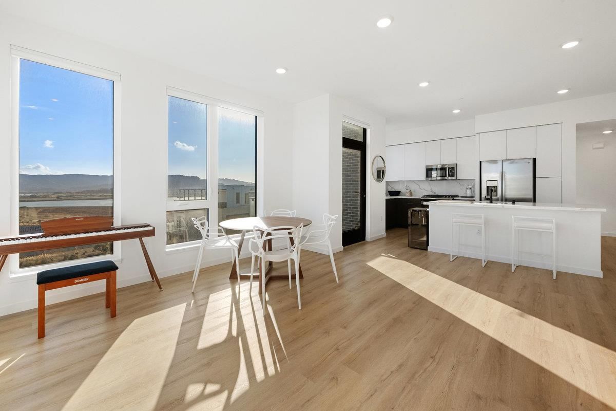 Dining room, Interior, Kitchen, Recessed Lighting, Stainless Steel Appliances, Wood Texture Flooring