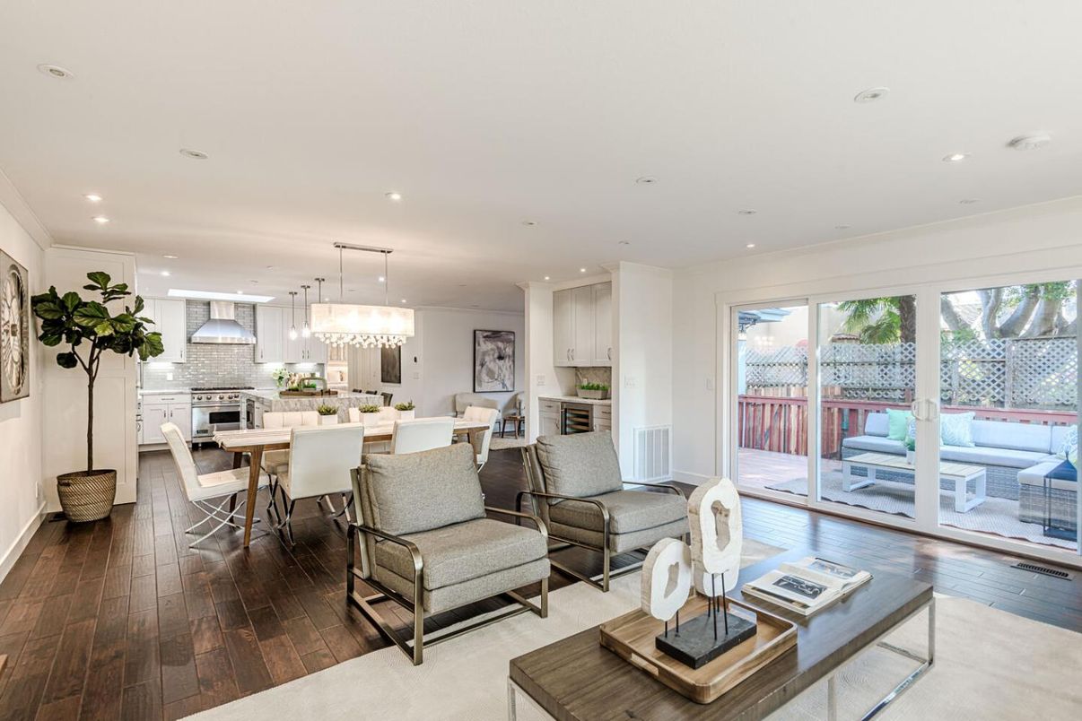 Chandelier, Dining room, Interior, Kitchen, Living room, Pendant Lights, Recessed Lighting, Stainless Steel Appliances, Wood Texture Flooring