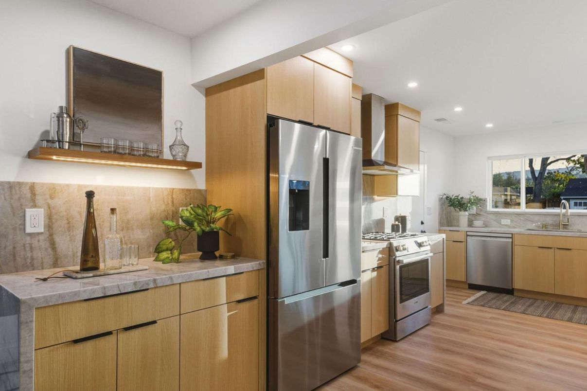 Interior, Kitchen, Recessed Lighting, Stainless Steel Appliances, Tile Countertops, Wood Texture Flooring