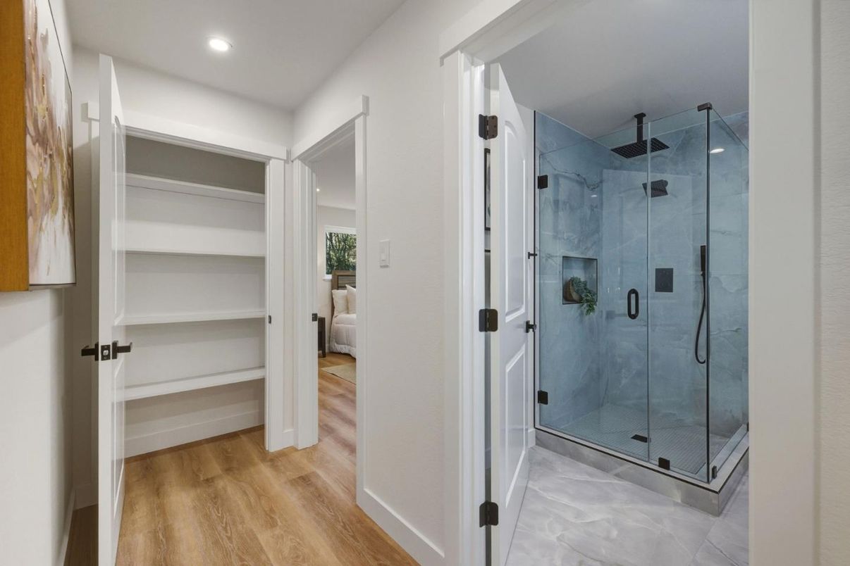 Bathroom, Glass Shower, Interior, Recessed Lighting, Walk-in Closets, Wood Texture Flooring